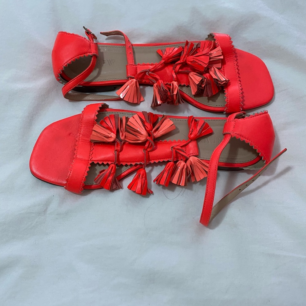 Bright orange flat sandals
